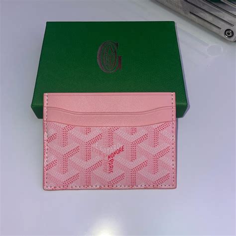 pink goyard wallet for women.